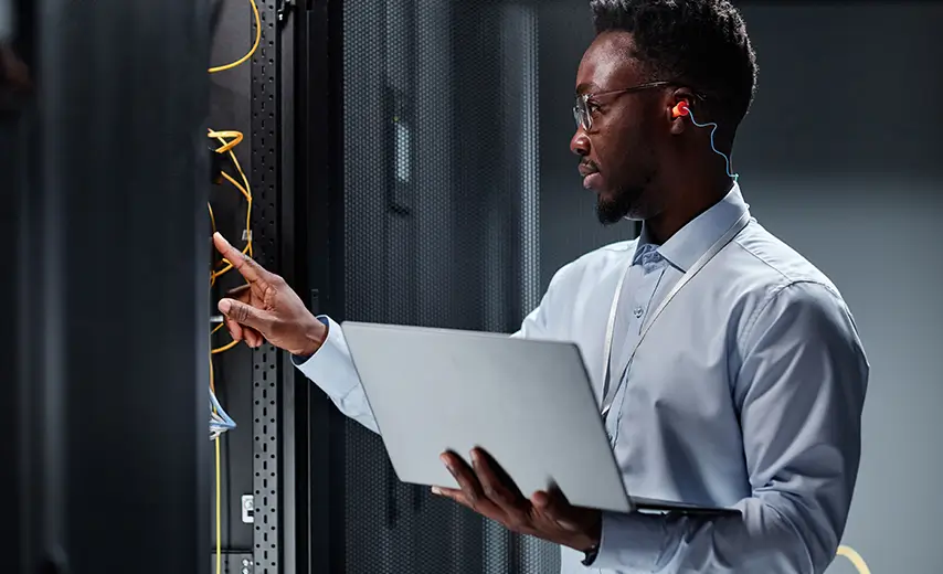 Shot of a man and woman using technical services